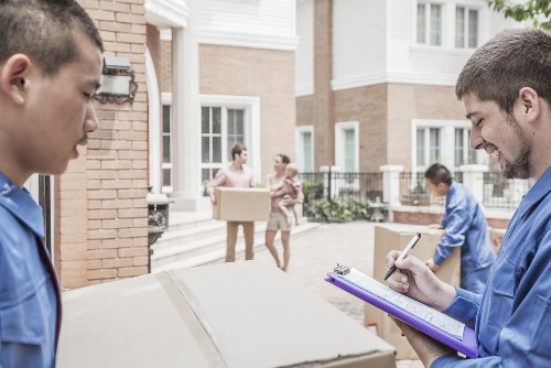 Professional movers assisting with home relocation in Putney