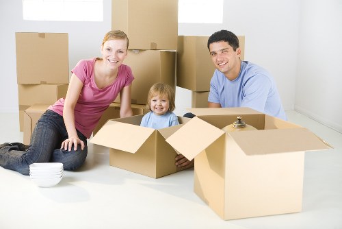 Professional commercial movers handling office equipment in Putney