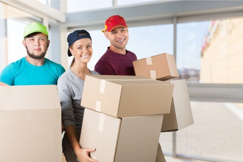 Moving truck loaded with household items ready for relocation in Putney
