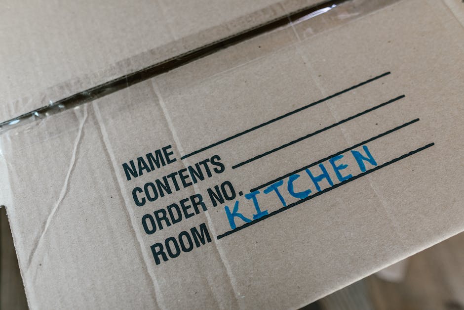 A piece of bright yellow paper with torn edges reveals a white inner layer with the words 'Good Price' printed in black ink. The torn paper creates a jagged opening around the message, which is center